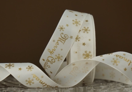 Репсова новорічна стрічка "Merry Christmas" Сніжинки Зірки кремова (2,5 см *23 м)(1рулон)