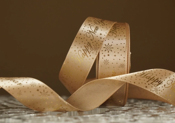 Атласна новорічна стрічка "Happy New Year" з салютом світло-коричневий (2.5 см *23 м) (1рулон)