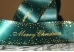 Атласна новорічна стрічка "Merry Christmas" Зірки зелена (4,0 см *23 м) (1рулон)