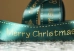 Атласна новорічна стрічка "Merry Christmas" з ягідкою зелена (4,0 см *23 м) (1рулон)