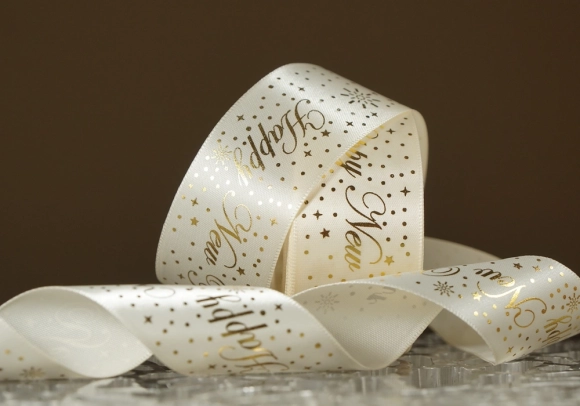 Атласна новорічна стрічка "Happy New Year" з салютом молочний (4,0 см *23 м) (1рулон)