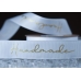 Стрічка репсова з написом "Hand Made" (2,5 см *23 м), білий (№01m) (1рулон)