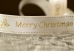 Атласна новорічна стрічка Merry Christmas молочний (2,5 см *23 м) (1рулон) Атласна новорічна стрічка Merry Christmas молочний (2,5 см *23 м) (1рулон)