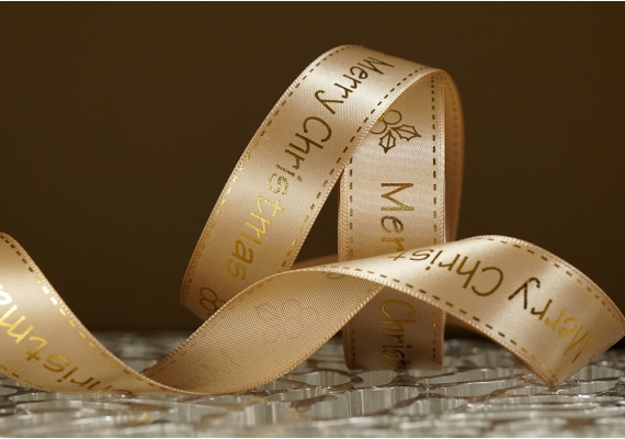 Атласна новорічна стрічка Merry Christmas світло-коричневий (2,5 см *23 м)