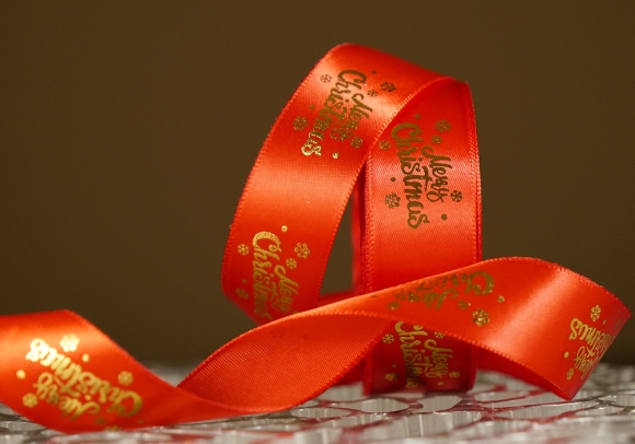 Атласна новорічна стрічка Merry Christmas-2 червоний (2,5 см *23 м)(1рулон)