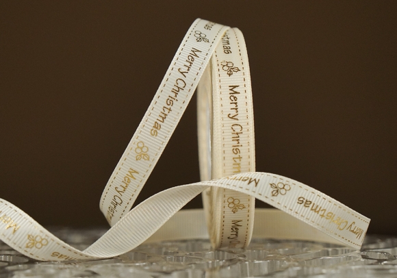 Репсова новорічна стрічка "Merry Christmas" молочний (1,2 см *23 м) (1рулон)