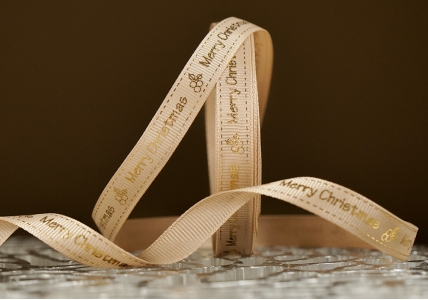 Репсова новорічна стрічка "Merry Christmas" коричневий (1,2 см *23 м) (1рулон)